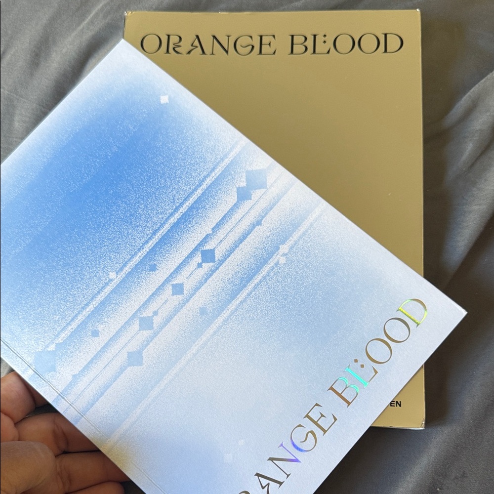 Orange Blood Album with Blue and White Cover